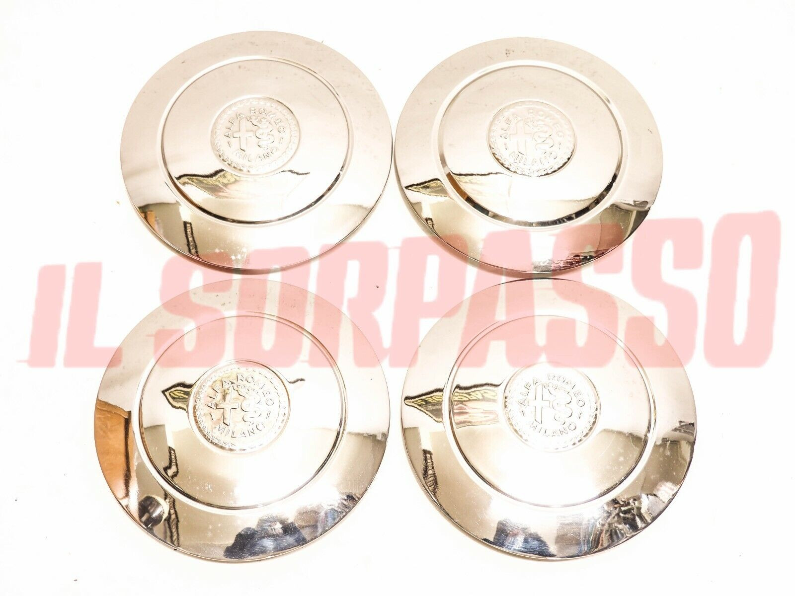 COPPE RUOTA BORCHIE CERCHI ALFA ROMEO GIULIETTA BERLINA ORIGINALI .