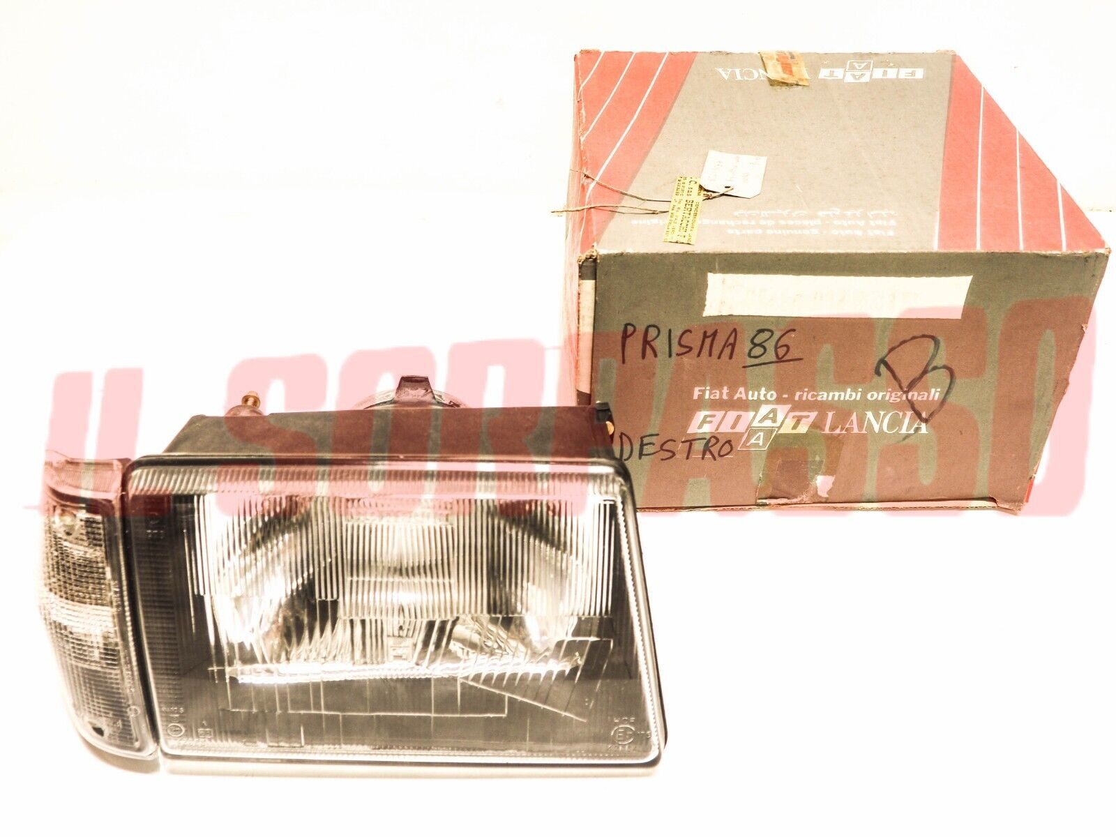 GRUPPO OTTICO DESTRO FANALE FARO + FRECCIA LANCIA PRISMA RESTYLING 1986 CARELLO