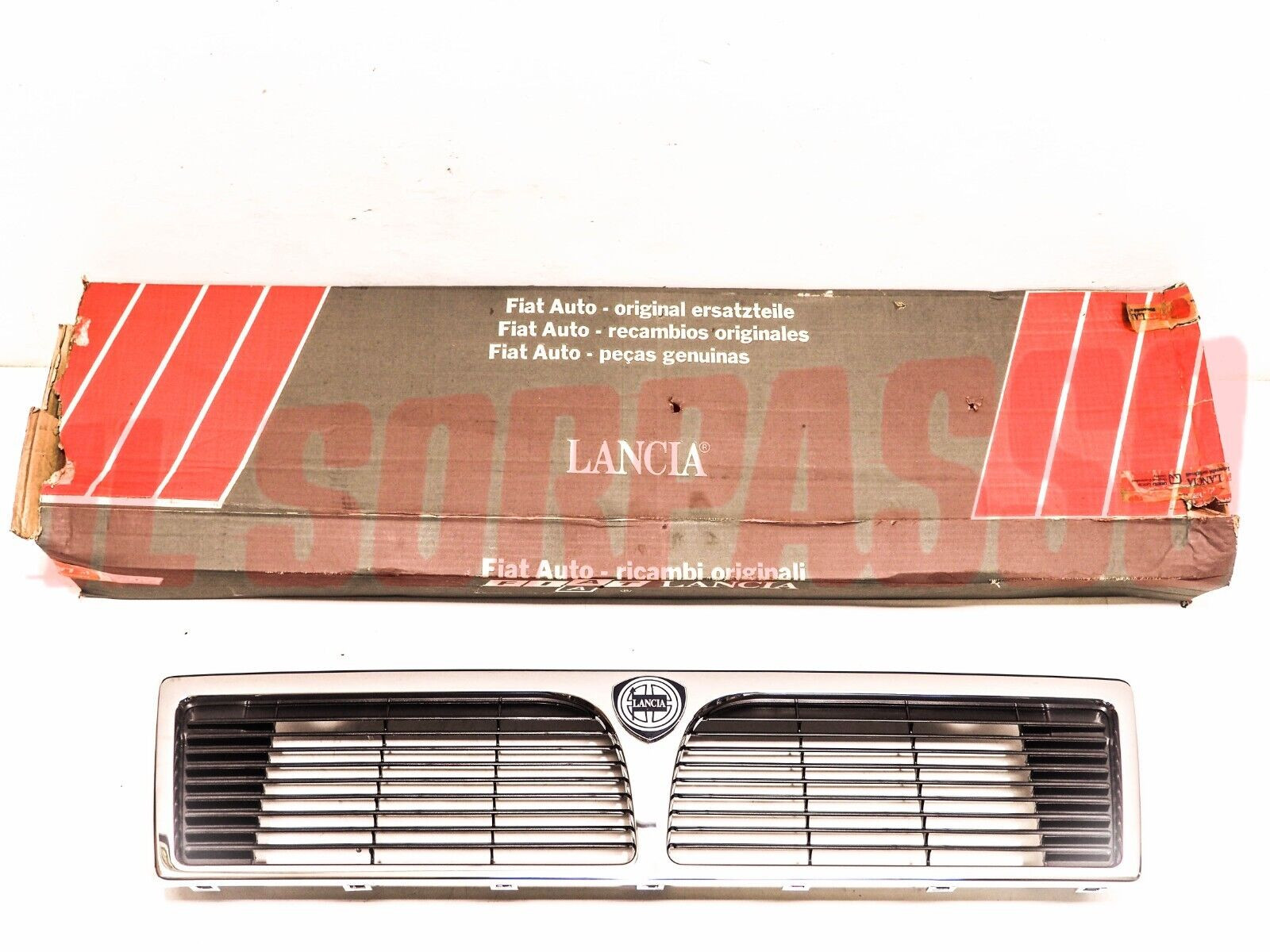 MASCHERINA GRIGLIA CALANDRA + STEMMA LANCIA PRISMA ULTIMO TIPO 82435927