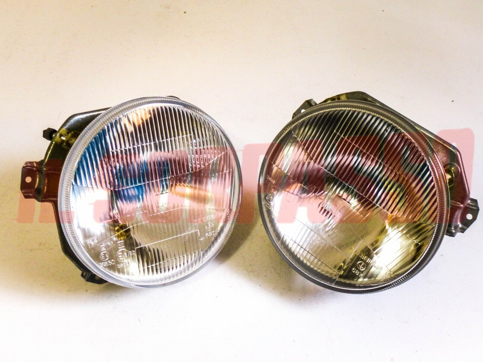 GRUPPI OTTICI FANALI GHIERE FARI VOLKSWAGEN GOLF + CABRIO MK1 CARELLO H4