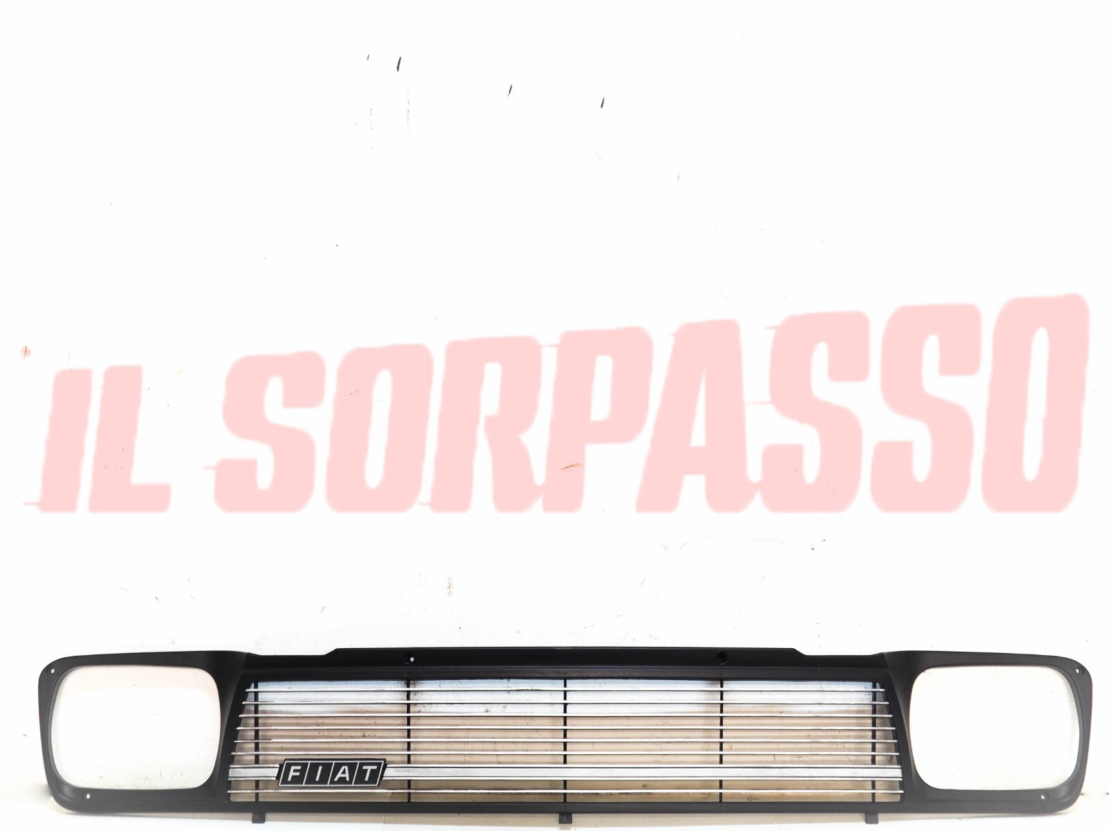 MASCHERINA GRIGLIA CALANDRA ANTERIORE CON SCRITTA FIAT 127 C - CL ORIGINALE