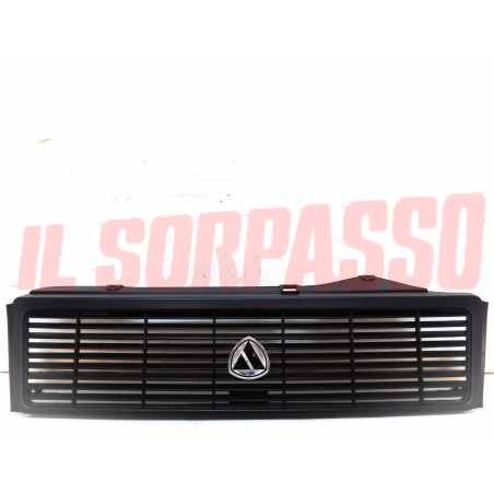 MASCHERINA GRIGLIA + STEMMA AUTOBIANCHI Y10 1 SERIE