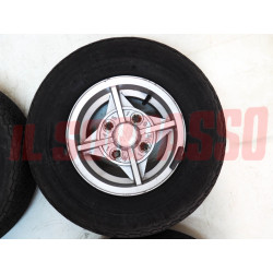 CERCHI RUOTA + PNEUMATICI + TAPPI INNOCENTI MINI MINOR COOPER O FIAT 500 ABARTH