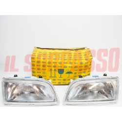 GRUPPI OTTICI FANALI FARI DESTRO SINISTRO VOLVO V40 KOMBI DAL 1996 AL 2000 HELLA
