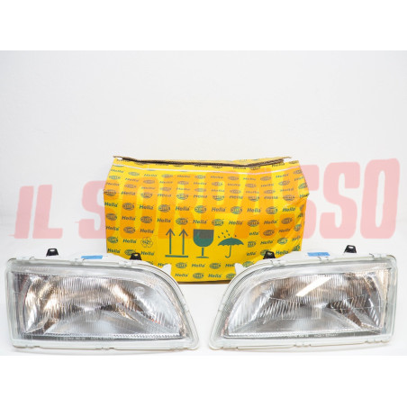 GRUPPI OTTICI FANALI FARI DESTRO SINISTRO VOLVO V40 KOMBI DAL 1996 AL 2000 HELLA